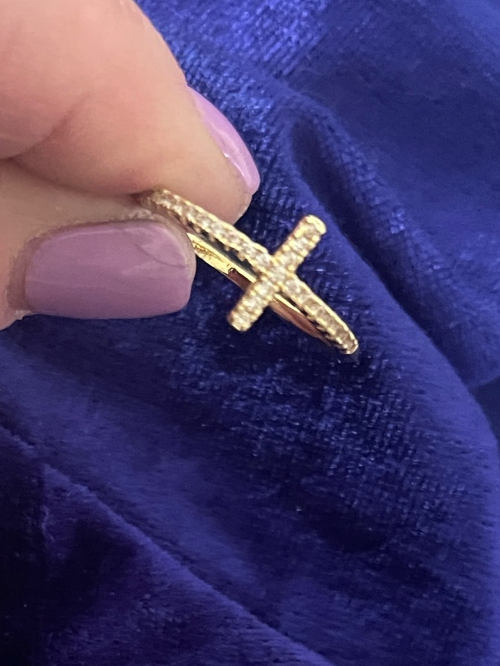 Gold Cross Ring on Deep Royal Blue Velvet